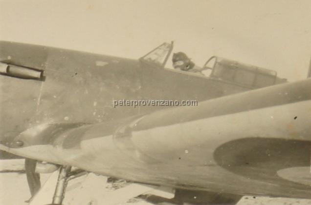 Peter Provenzano Photo Album Image_copy_062.jpg - Squadron leader Chesley Peterson in the cockpit of a Hawker Hurricane I.  RAF Station Kirton Lindsey, winter of 1941.
